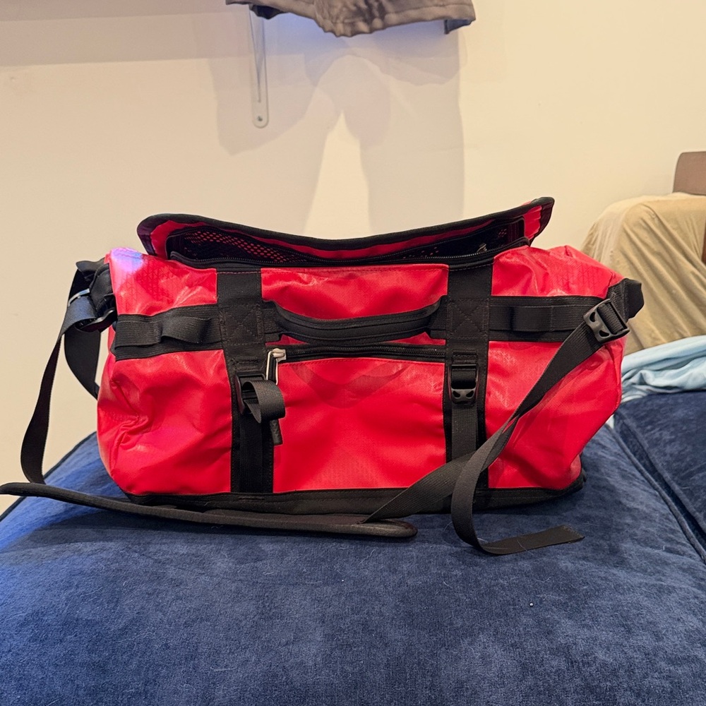The North Face Red Base Duffel Bag with Black Straps XS